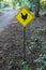 Road sign warns of chicken crossing