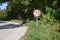 Road sign that warns drivers that maximum speed is 70 kilometers per hour