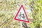 Road sign which shows the bike. The sign stands