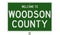 Road sign for Woodson County