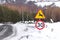 Road signs: cautiously wild animals, speed limit up to 30 km / hour and cycling tourist trail. Warning of danger in the mountains