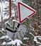 Road signs fall under the weight of snow and cold