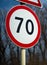 Road signs speed limit 70 km per hour. Close up shot raw footage