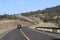 A road snakes through the countryside between the towns of Nyeri and Nyahururu in Kenyan\'s agricultural heartland.