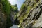 Road between steep rocks of Maninska tiesnava gorge, Slovakia