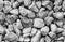 Road stones gravel texture, rocks for construction, gray background of crushed granite gravel, small rocks, closeup