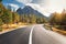 Road in summer forest at sunset in Italy. Mountain roadway