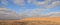 Road at sunset crossing the Karakum desert in Turkmenistan