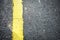 ROAD SURFACE WITH YELLOW CONTINUOUS LINE