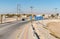 The road to enter in Sur City with Street sign indicating the city center and the beach, Sultanate of Oman