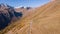 Road to the Gavia mountain pass in Italy. Amazing aerial view of the mountain bends creating beautiful shapes. Fall time