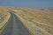 The road to Holy Lavra of Saint Sabbas the Sanctified Mar Saba through Judean desert. Bethlehem, West Bank / Israel