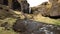 The road to the Kvernufoss waterfall in the south of Iceland, on the Golden Ring. Mountain river in a gorge with moss