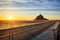 Road to Mont Saint Michel at sunset