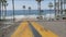 Road to ocean beach California USA. Summertime palm trees. Summer coast near Los Angeles. Sea waves.