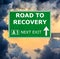 ROAD TO RECOVERY road sign against clear blue sky