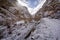 Road to Rumbak Valley and Yarutse, Hemis NP, Ladak, India. River with snow during winter, Himalayas. Mountain landscape in India