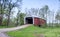 Road to a rural covered bridge