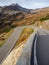 Road to the San Bernardino mountain pass in Switzerland. View of the mountain bends creating beautiful shapes