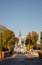 Road to Sanctuary of Our Lady in Lourdes, France. Famous religious centre of pilgrims. Aerial view of catholic cathedral.