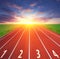 Road to success. Concept of competition. Athletics sport track and sky