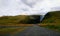 Road to waterfall cliff Rock Iceland green grass cloud