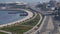 Road traffic on the highway passing along the seaside Boulevard in Baku, Azerbaijan. On a Sunny summer day.