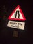 road traffic sign at night construction work single file traffic