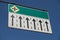 Road traffic sign soars into blue sky