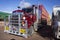 Road train trucks waiting to be loaded