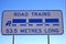 Road Trains Sign in against blue sky