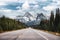 Road trip and canadian rockies on highway in national park at Icefields Parkway