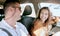 Road trip, couple and smile in car travel together in traffic for driving, transport or urban adventure in city. Man
