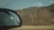 Road trip by highway in desert. Adventure Travel in a desert slow motion.