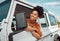 Road trip travel, black woman and window freedom to relax in camping car, summer countryside and vacation adventure in