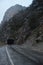 Road In A Tunnel Caught In The Rock Of A Gorge That Surrounds The Plandescun Reservoir A Rainy Day In Plan. Travel, Landscapes,