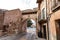 Road under the beautiful medieval-styled arch