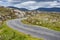 Road winding through the rocky Scottish landscape