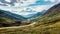 Road winding through Scottish Mountains. Bus driving the road to Torridon in Scottish Highlands. Western Scotland