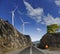 The road, windmills and mountains
