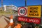 Road work ahead reduce speed 40 KM/H speed limited zone safety warning sign