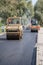 Road workers and equipment in the repair of roads in Central Russia.
