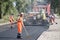 Road workers and equipment in the repair of roads in Central Russia.