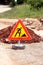 Road works sign for construction works, road, pavement construction. Traffic, warning sign road repairing, road maintenance.