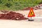 Road works sign for construction works, road, pavement construction. Traffic, warning sign road repairing, road maintenance.