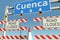 Roadblock near Cuenca city road sign. Quarantine or lockdown in Ecuador conceptual 3D rendering