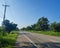 Roads, trees and grass, roadside, electricity poles