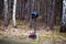 A roadside cross with a motorcycle helmet commemorating the tragic death of a motorcyclist.