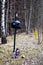 A roadside cross with a motorcycle helmet commemorating the tragic death of a motorcyclist.