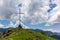 Roadside cross with orthodox Saint icon on a hill on M-20 road to Tskhratskaro Pass, Georgia